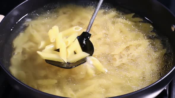 Pasta Mixing in Bowl