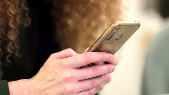 Hand Girl Using Texting Mobile Phone or Chat