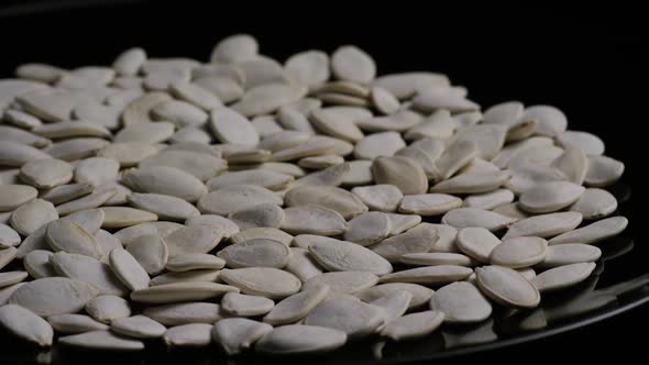 Cinematic, rotating shot of pumpking seeds - PUMPKIN SEEDS 015