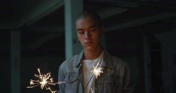 Fashionable young man in an abandoned warehouse