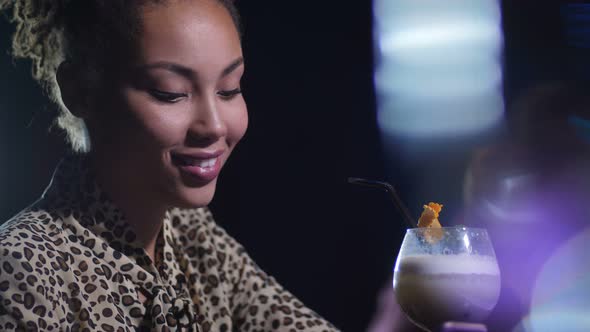 Portrait of Single Charming Woman Drinking at Bar