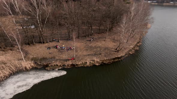 Overhead View of People Resting at the Beach of Early Spring Lake