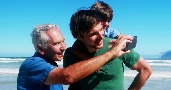 Happy family enjoying together at the beach