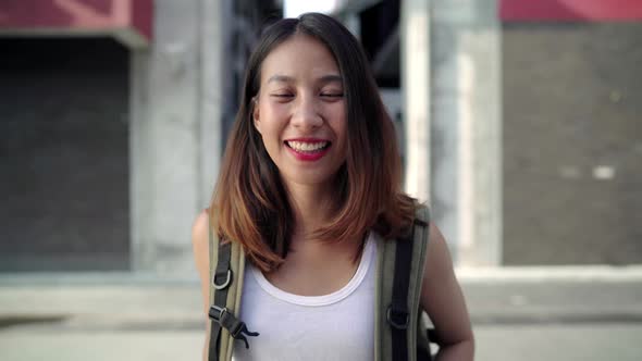 Asian backpacker woman feeling happy traveling blogger female walking at Chinatown 