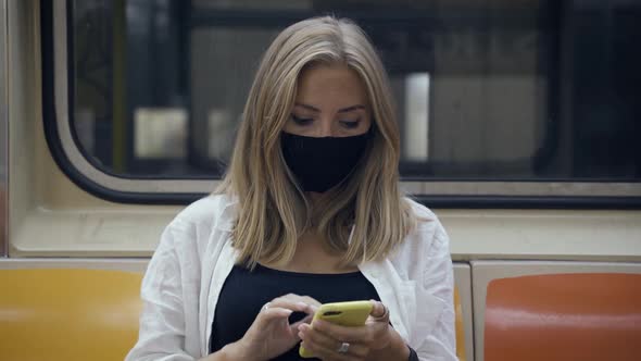 Woman in Subway Train