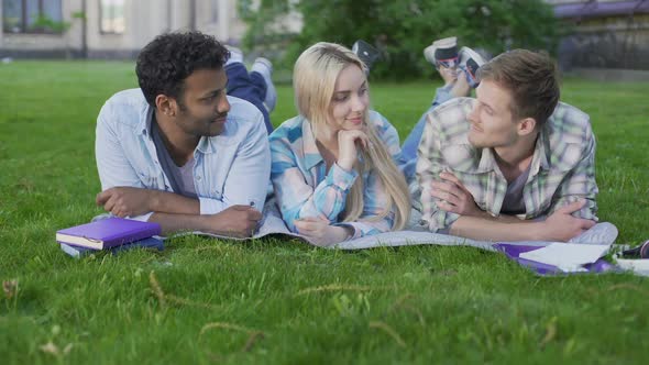 Charming Blonde Girl Flirting with Two Guys Choosing Best One, Relationship