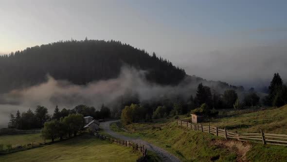 Morning Fog Over Mountain Village