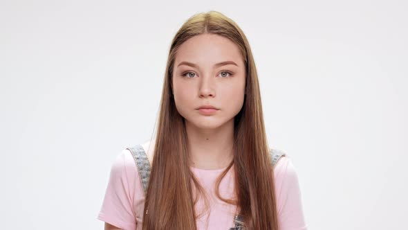 Sad Young Beautiful Girl Over Jittering White Background