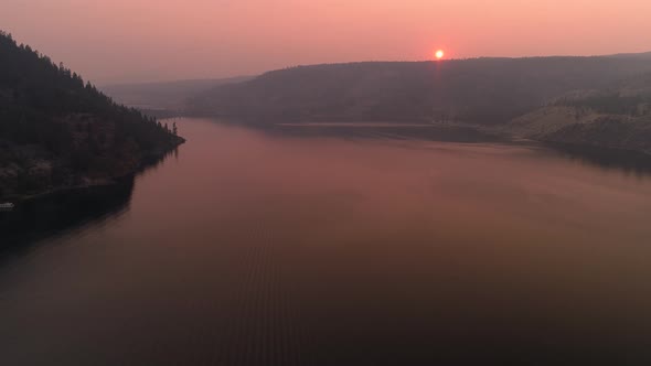 Sunset Aerial Over Lake Roosevelt In Forest Fire Smoke Haze