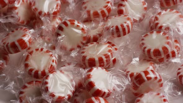 Rotating shot of peppermint candies - CANDY PEPPERMINT