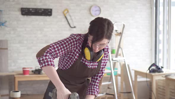 Portrait Professional Young Worker Carpenter Woman Working Electric Drill