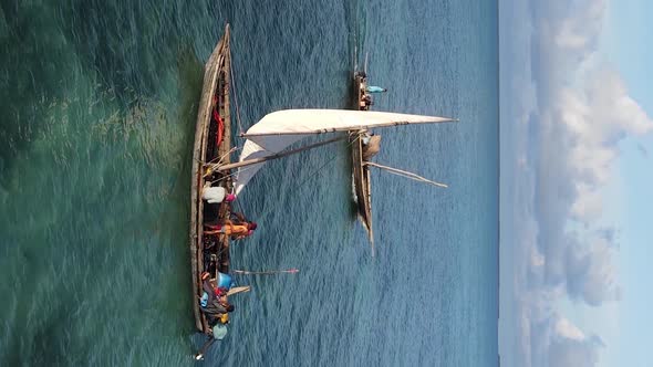 Tanzania Vertical Video  Boat Boats in the Ocean Near the Coast of Zanzibar Aerial View