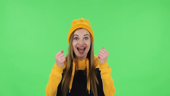 Portrait of Modern Girl in Yellow Hat with Shocked Surprised Wow Face Expression and Having Fun