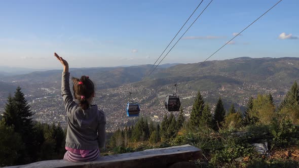 Little Girl Watching Cable Car