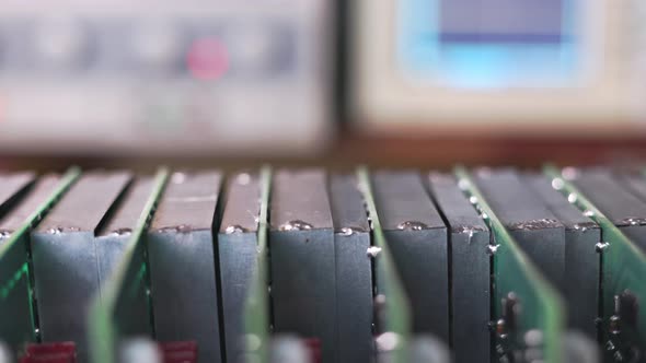 Slider Shot of a Metal Components and Microcircuits in Workshop Laboratory