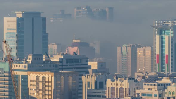 Skylines Under the Thick Fog at the Street Timelapse of Abu Dhabi at Morning