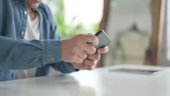 Close Up of Hand Using Smartphone Mobile