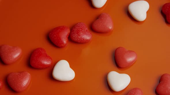 Rotating stock footage shot of Valentines decorations and candies - VALENTINES 0045
