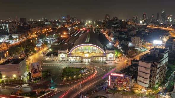 Time lapse of Aerial view of Hua Lamphong or Bangkok Railway Terminal Station with skyscraper