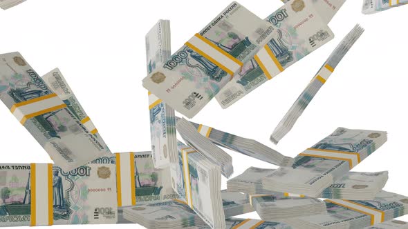 Many wads of money falling on table. 1000 russian ruble banknotes.