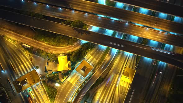 4K UHD : Aerial of drone flight over highway at night rush hour traffic