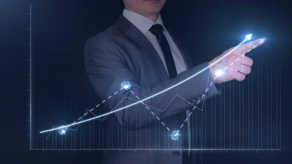 Businessman Draws a Graph of Growth on a Virtual Touchscreen Panel alt