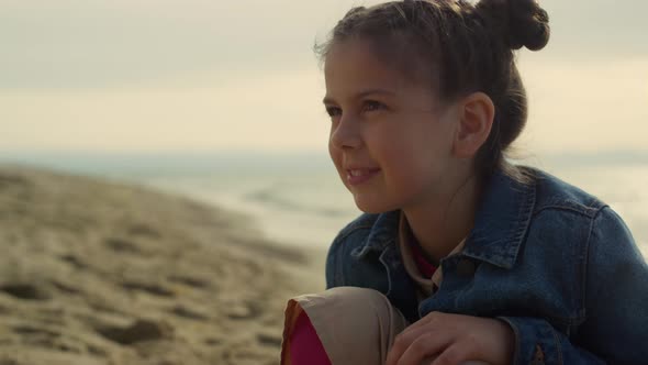 Joyful Kid Feeling Happy on Sea Beach