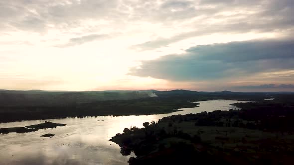 Scenic view of Nile river in Jinja Uganda. Drone reveal natural African landscape and dramatic sky.