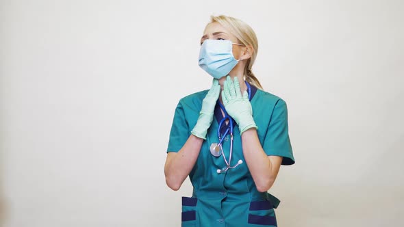 Medical Doctor Nurse Woman Wearing Protective Mask and Rubber or Latex Gloves - Neck Illness