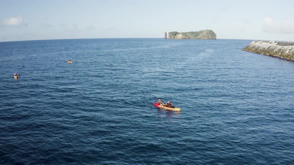 Aerial view of people doing kayak in Azores, Portugal.