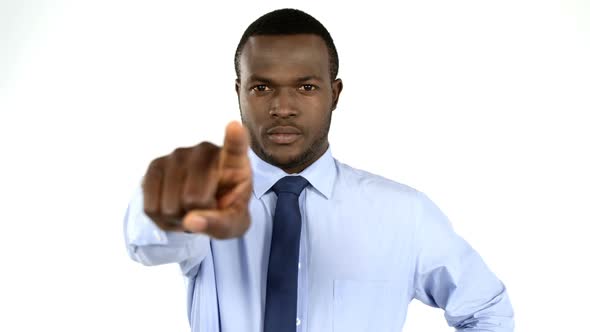 Portrait of businessman pointing