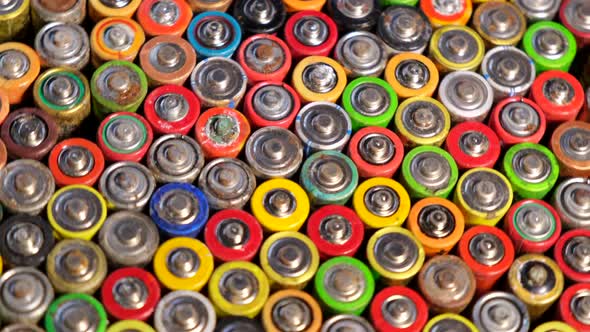 Ternopil, UKRAINE, August 10, 2020: Used batteries, waste, many colored batteries.