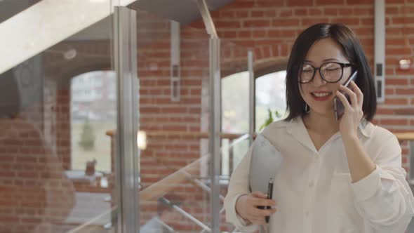 Beautiful Asian Businesswoman in Office