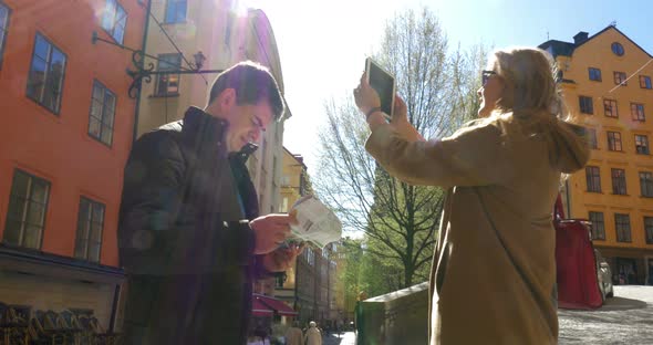 Two Tourists Walking in Stockholm