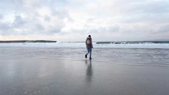 Lady Enjoying the Fresh Air at the Beach