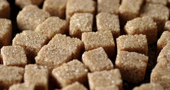 The Cubes of Cane Sugar Rotate Slowly