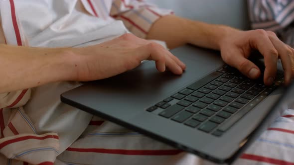 Closeup Man Using Touchpad at Home Office