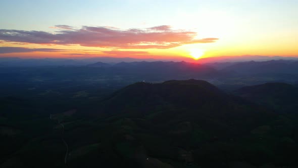 4K Aerial drone of Epic mountain with a colorful sunset