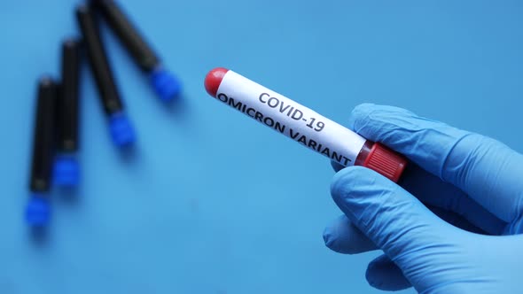 Hand Hold Omicron Variant Corona Virus Blood Test Tube