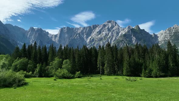 Emerald lake at Fusine with Mangart mountain