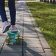 Dynamic video of legs of girl in jeans riding skateboard, steadicam, back view. - VideoHive Item for Sale