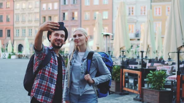 Tourists Making Selfie on Smartphone in the City Center