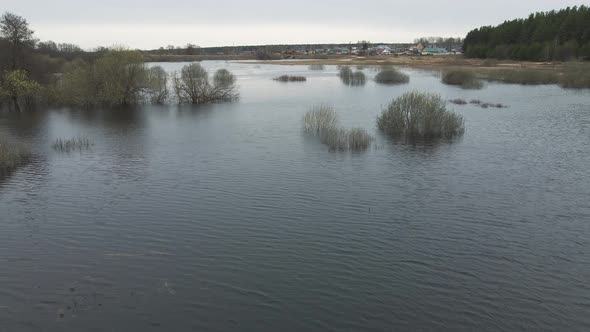 Spring Flood Bird'seye View Bushes in the Water in the Distance Village