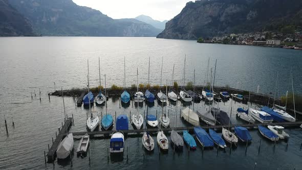 Aerial video of boats during spring in Fluelen Switzerland (2)