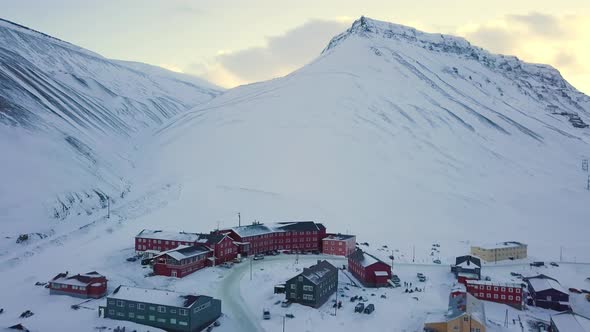 Aerial View of Longyearbyen in Winter Svalbard With Houses Snowcapped Mountains