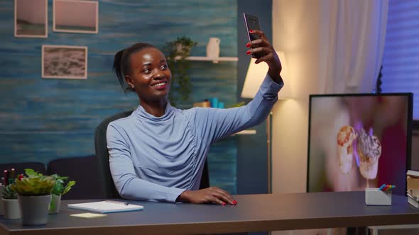African Woman Taking a Selfie Using Smartphone