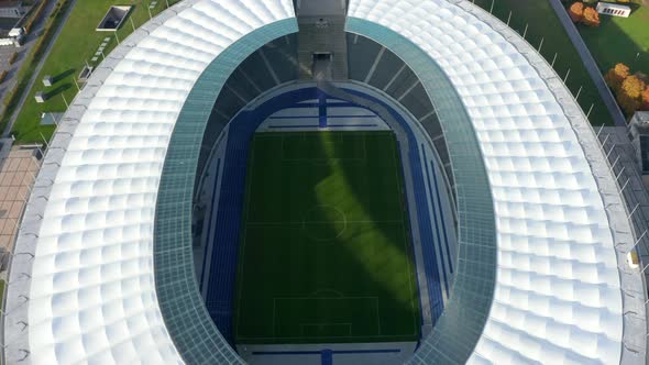 Empty Soccer Field Football Stadium Green Grass, Aerial Birds Eye Overhead Top Down Wide Shot