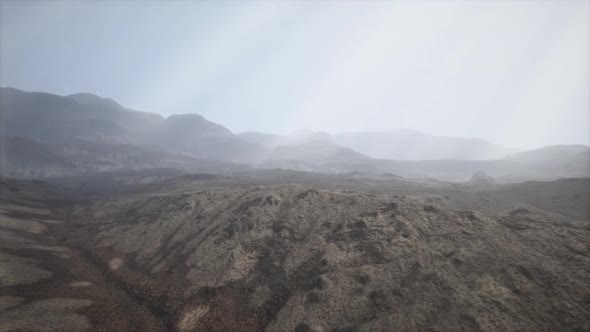 Sun Rays Against the Backdrop of the Mountains