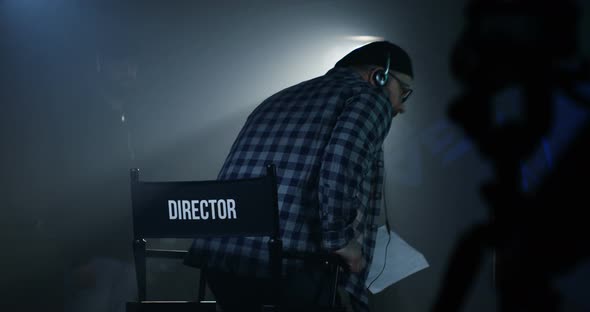 Director Sitting in His Chair on a Film Set