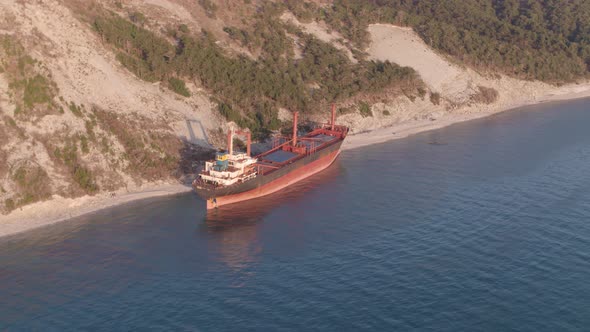 The Ship Ran Aground. Environmental Pollution at Sea. Aerial View. Grounded Ship. Drone Footage